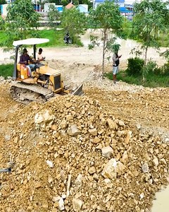 12K views · 278 reactions | Opening a New Project! MITSUBISHI BD2F Bulldozer Pushing Stone into Water with 5T Truck | Bulldozer Cambodia | Facebook