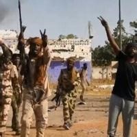 An image from an RSF handout video showing its fighters in Sudan's El-Fasher where they are accused of executing civilians