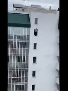 Woman Jumps From Building