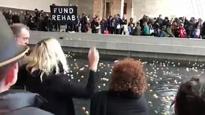 Protesters throw pill bottles in famous museum | CNN
