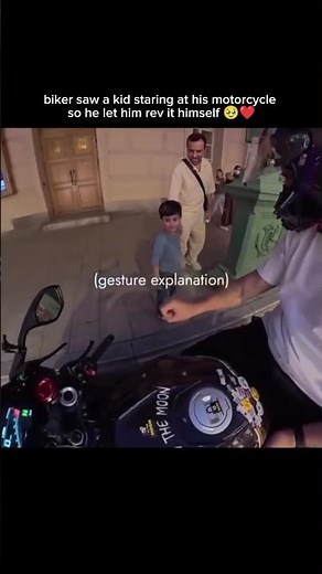 biker saw a kid staring at his motorcycle so he let him rev it himself 🥹❤️