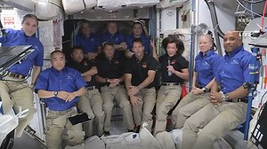 Four astronauts on Elon Musk's SpaceX capsule dock at space station
