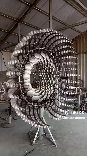 Wind Dance: Dynamic Stainless Steel Sculpture