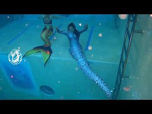 Snake girl plays with mermaids