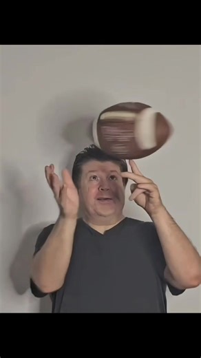 Juggler Spins Football on Finger for Super Bowl