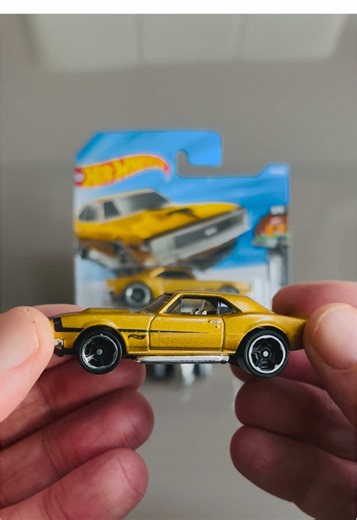 Check out this Hot Wheels ’67 Camaro in Gold — classic muscle with premium shine! Sleek lines, that gold glow, and zero chill. Ready for the collection or center-stage on your shelf! #hotwheels #camaro #diecastcommunity #cartok #collectibles