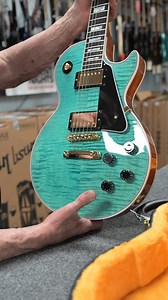 💎 **AQUA BLUE LES PAUL CUSTOM | LIGHTWEIGHT BEAUTY** 💎 Welcome to **Bizarre Guitar – Reno, Nevada**. Today we’re introducing a truly eye-catching piece: an **Aqua Blue Les Paul Custom** that’s as comfortable to play as it is stunning to look at. Built by **Gibson**, this Custom features a **chambered, lightweight design** at just **8 lbs** — perfect for players who love Les Paul tone without the heavy feel. ✨ Aqua Blue finish with 3-way flame top ✨ Mahogany body & neck ✨ All-gold hardware ✨ Eb