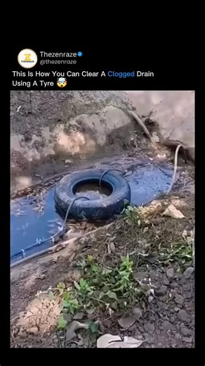 TheZenraze on Instagram: "THIS DRAIN-CLEARING TRICK USES NOTHING BUT PHYSICS No machines. No chemicals. Just a tire and a rope. A rubber tire is lowered into the blocked drain and pulled back and forth, acting like a flexible piston. As it moves, it creates alternating suction and pressure inside the pipe, forcing water to surge around it and loosen packed mud, leaves, and debris. At the same time, the tire presses against the pipe walls, scraping buildup without damaging the drain. It’s simple 