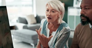 Computer, learning or mature business people with help, company manager or support for training. Feedback, problem solving and financial advisors speaking of investment for advice, growth or teamwork