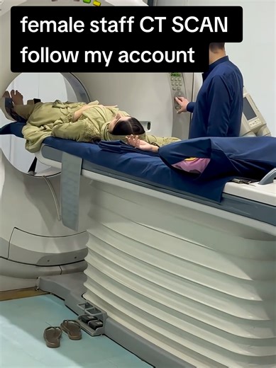 Female Staff Performing CT Scans in London