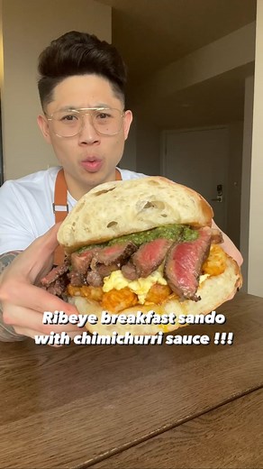 Kristopher l Houston Food and Travel on Instagram: "💬 Taking the elevator this morning cause you’ll want to meet me at this spot in breakfast heaven 🤤. THIS RIBEYE BREAKFAST SANDWICH with CHIMICHURRI SAUCE is the perfect elevator pitch 🔥 Ingredients: * 1 large ciabatta bread * 10oz Ribeye steak * tater tots * 4 eggs * Spicy mayo Chimichurri Sauce Ingredients: * 1 cup firmly packed fresh flat-leaf parsley leaves * 3 to 4 garlic cloves * 1/3 cup extra virgin olive oil * 2 tablespoons white wine