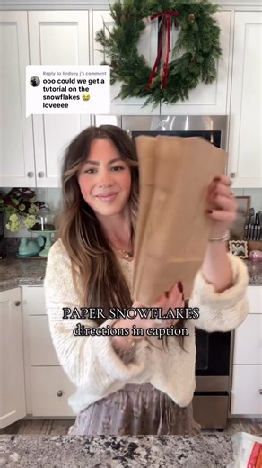 grace coats on Instagram: "Resharing the paper snowflake tutorial as it’s one of my most requested and so simple! I glue together at least 9 bags (or up to 12) with a “T” shape of hot glue. Cut out my pattern/design and then open it up! Glue your ends together (or use a light weight magnet for easier storing) and you have the most magical DIY Christmas Decor!"