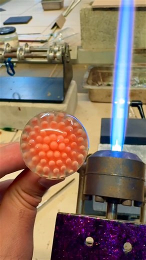 Matty P. Glass on Instagram: "Simple silver fumed dot implosion flamework process video 🔥 #glass #flamework #artprocessvideo #fumedglass #implosion #glassmarble #handmade"