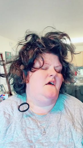 Curly Hair Movement in a Lively Indoor Setting