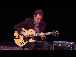 Andy Brown playing solo jazz guitar doing a Blues In G