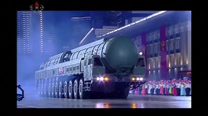 North Korea holds military parade, shows off new intercontinental missile