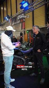 What is the benefit of replacing the original shock absorber with an Öhlins on a motorcycle?