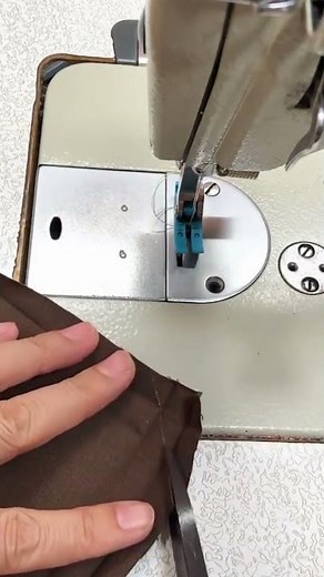 a process of sewing basic brown fabric with neat edges, easy and simple