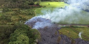 Puna lava flow enters cemetery, about half a mile from Pahoa town