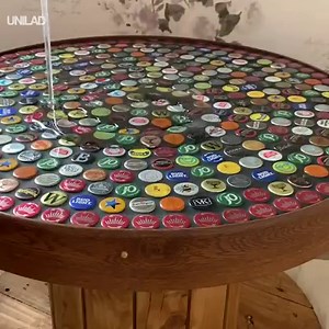 2.1M views · 11K reactions | This bottle cap table transformation looks too good  | UNILAD | Facebook