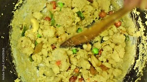 Preparation of Upma, a south Indian breakfast food dish. It is made of Rava, which is called Suji in popular Hindi Language in India and cream of wheat in English. Upma is a delicacy amongst Indians.