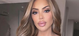 Larsa Pippen Lowers Sweatpants Without Visible Underwear