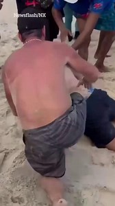 Moment Brit beachgoer is saved after being swallowed in 8ft hole he’d dug | The Sun