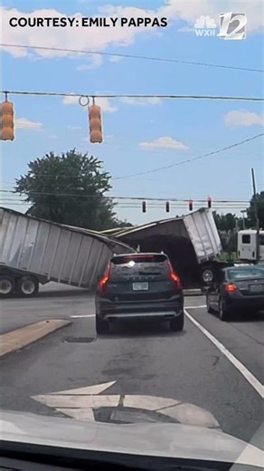 Tractor-trailer falls apart while traveling through intersection