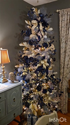 Our dining room tree is finished and I couldn't be happier with how it looks! Much of the furniture in our dining room is old/antiques that have been refurbished and it has a blue and gold colour scheme. I really wanted to carry that through with the tree, so my goal was to create a Marie Antoinette inspired tree and I think I've get it right! | Lord Byron's Kitchen