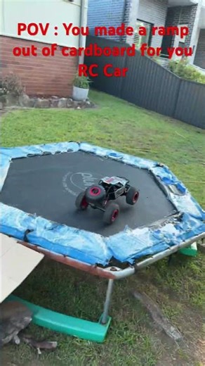 We made a ramp out of cardboard for our RC car