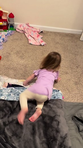 Stinky diaper change time is always a fight 😂😂 (dont judge the laundry its clean ill get there ) 😂 #chasingtoddlers #diaperchange #runaway #smelly #toddlersoftiktok #parentsoftiktok #fyp #toooldtorun