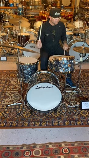 Revival Drum Shop is honored to host a legacy in drums: introducing the new Slingerland Radio King Outfit. Shown in Black Diamond Pearl. 8x12 rack tom, 14x14 floor tom, 14x20 bass drum and a 5.5x14 “Artist” snare drum. 3-Ply Mahogany/Poplar shells with solid maple reinforcement rings, 30° round over bearing edges, internal mufflers in snare and toms, nickel-plated hardware, Slingerland cloud badge, stick saver hoops, heavy duty folding spurs and a modern Zoomatic style throw-off. Welcome back Sl