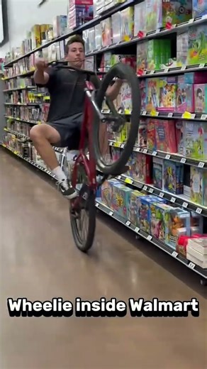 WHEELIE INSIDE WALMART #wheelie #walmart #mtb #funny