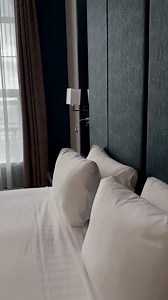 Welcome to the Presidential Suite. This expansive open-plan suite invites you to relax in a super king bed, unwind by the cosy fireplace, and take in sweeping sea views from your private seating area. Enjoy modern comforts including a smart TV, Nespresso coffee maker, fridge, and in-room safe. The bathroom is a true retreat, featuring a free-standing bath and walk-in shower, perfect for unwinding after a day exploring Cobh. Take a sneak peek with Sabrina. #TheCommodoreHotel #PresidentialSuite #L