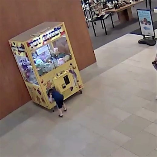 Prize-seeking kiddo trapped in claw machine after trying to snag toy triggers police rescue in wild footage