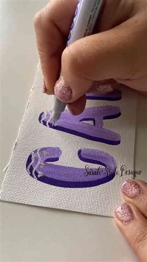 Silver details that make this purple lettering shine