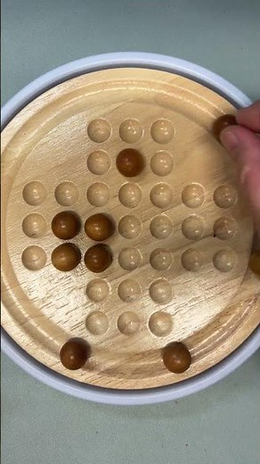 Watch This Peg Solitaire Puzzle Get Solved