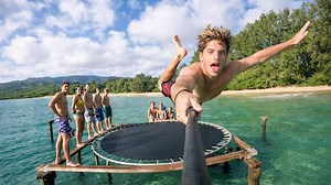 Jumping on a trampoline at sea