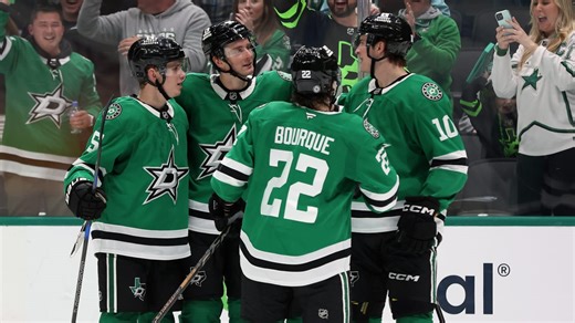 Stars score 4 straight in 3rd period to defeat Flames