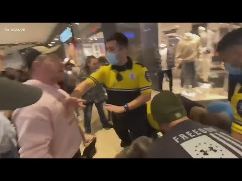 Brawl at the mall: Mask protest turns into a melee when police arrive