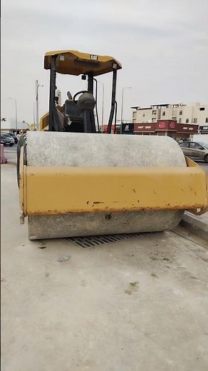 Heavy equipment machine (pison) working in the field front view