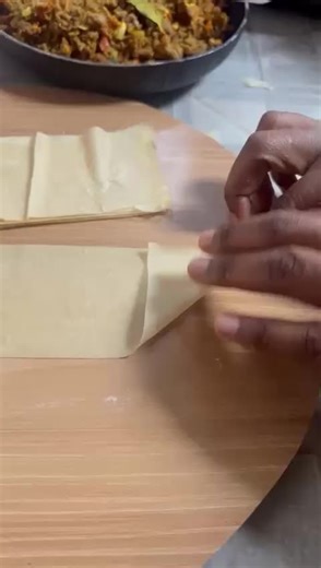 Samosa folding made easy stop stressing the triangles and start folding like a pro. Our wrappers are thin, crispy and super easy to work with struggling with those corners? we've got you covered🤩🔥 Here is a step by step guide on how to get that perpect leak proof triangle using our fresh wrappers ✓step 1 Create the cone ✓Step 2 fill it up (don't overstuff) ✓Step 3 seal the edges tight. Who's making samosas this weekend ?tag a friend who needs this tutorial!👇save the video for your next kitche