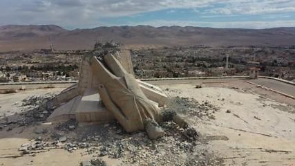 Rebels topple largest statue of Hafez Assad in Syria