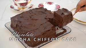 How to make Chocolate Mocha Chiffon Cake that melts in your mouth. Here's what you'll need: FROSTING: 1 cup salted butter (227g) 2 cups icing sugar (260g) 1/2 cup pure cocoa powder (50g) 1 tsp vanilla extract (5ml) 1 cup whipping cream or heavy cream (250ml) CHIFFON CAKE: 1 and 3/4 cup plain flour (218g) or all purpose flour or cake flour 1/2 cup pure cocoa powder (50g) 1/2 tsp salt (3g) 2 tsp baking powder (8g) 1/2 cup sugar (100g) 4 egg yolks 1 and ½ cup evap milk (370ml) 1/3 cup oil (80ml) 1 