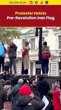 Protester Hoists Pre-Revolution Iranian Flag At Iran’s London Embassy Amid Anti-Regime Rally