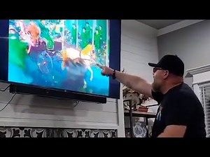 Man overwhelmed with emotions after trying colour blind glasses for first time | SWNS