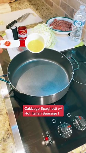 Delicious Cabbage Spaghetti with Hot Italian Sausage Recipe