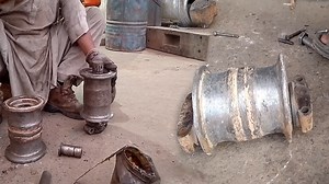 Restoring Excavator Chain Track Rollers with Heavy Wheels