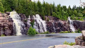 Cadillac Mountain Summit Road in Acadia National Park, Maine. Temporary waterfalls after heavy rain. Heavy rains created rare waterfalls.