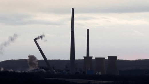 Homer City power plant demolition draws crowds as smokestacks partially collapse